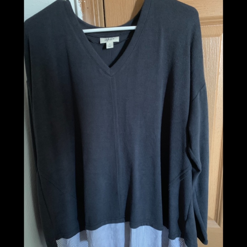 Navy blue long sleeve shirt.
